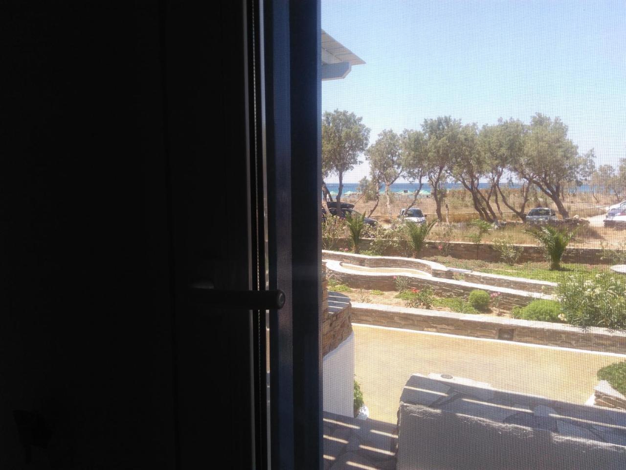 Nostos Beachfront Apartments & Studios Агиос-Иоаннис Экстерьер фото