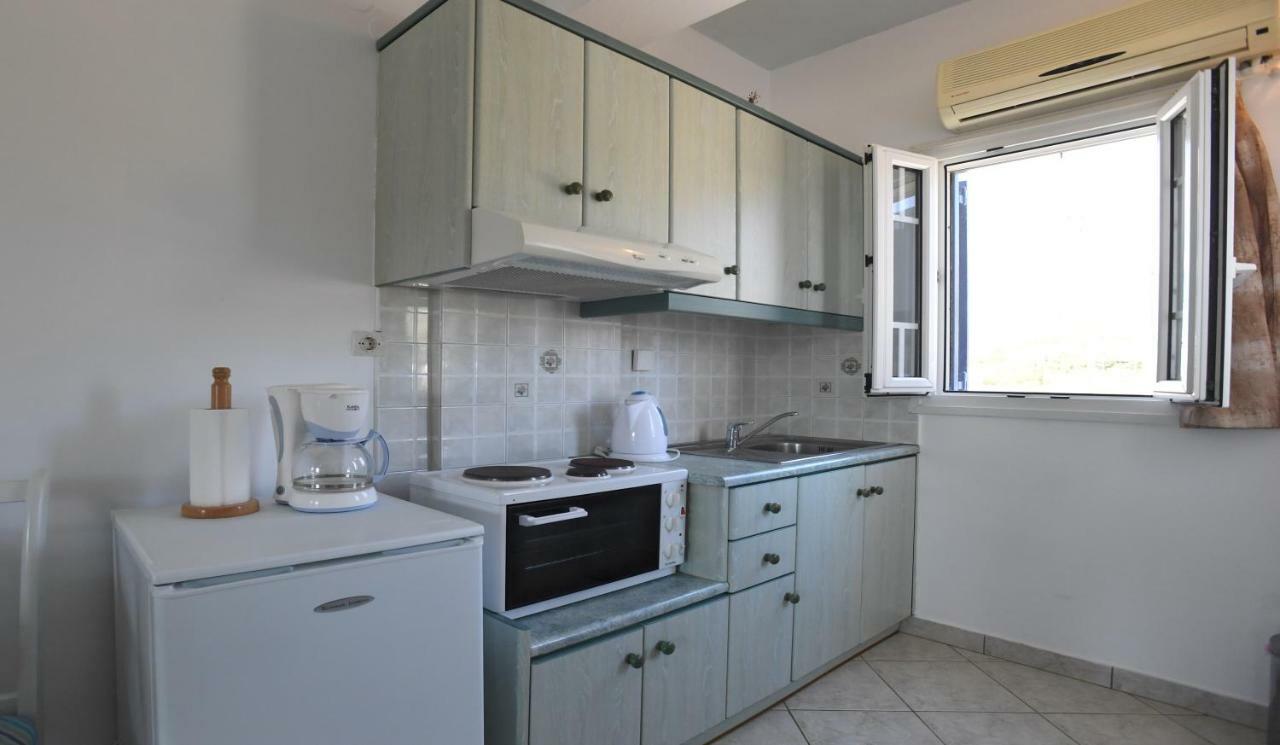 Nostos Beachfront Apartments & Studios Агиос-Иоаннис Экстерьер фото